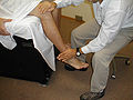 Neuro exam knee extension.jpg